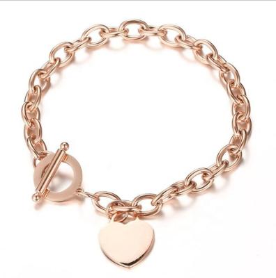 China Fashion Love Heart Stainless Steel Bracelet Not Easy Fading Custom Logo Rose Gold Charm T-Shaped Bracelet for sale