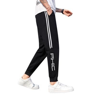 China Solid Color Slim Straight Casual Fitness Anti-Wrinkle Men's Pants Running Leg Sports Pants for sale