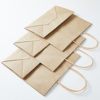 China Wholesale Custom Recyclable Logo Brown Craft Packaging Gift Recycle Bag Kraft Paper Shopping Carrier Bags With Handles for sale