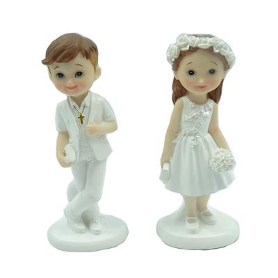 China Europe Christian Resin Beautiful Handmade Catholic First Communion Gifts Boy And Girl Statue for sale