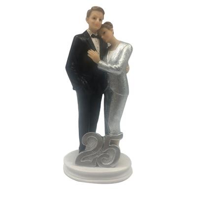 China Around the World Stunning Resin Silver Wedding Anniversary Cake Couples Statue for sale