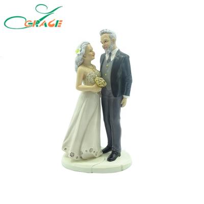 China Wedding Decoration Resin Gold Wedding Anniversary Gifts Fashion Wedding Couple Old Figurine for sale