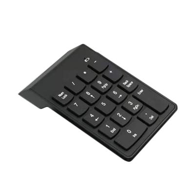 China Plug and play connect mini computer number keypad. 2.4g wireless chocolate number pad for sale