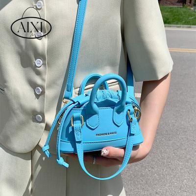 China Designer Purse Hot Selling Bags Famous Brand Women Handbags Mini Ladies Hand Mini Letter Drawstring Design Dome Graphic Bag for sale