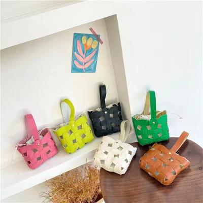 China Newspaper used new girl cross-body children handbags princess baby foreign small bag change small bag for sale