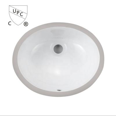 China Modern Hot Selling CUPC Approved Ceramic Oval Under Counter Wash Basin Mini Sink for sale