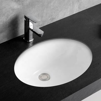 China Easy Clean European American Design White Ceramic Under Sink 1714 Counter Oval Ceramic Bathroom Basin for sale