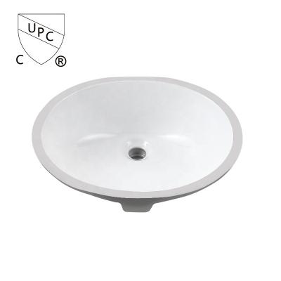 China Easy clean 1714 CUPC ceramic bathroom vanity oval undermount sinks with overflow hole for sale