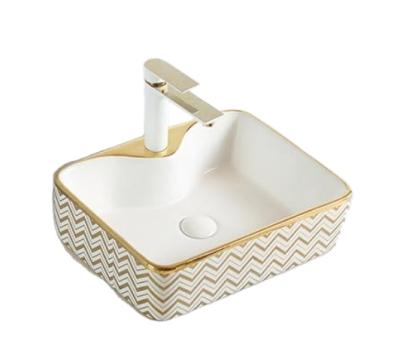 China Wholesale Ceramic Art Easy Clean Wash Basin Sanitary Elegant Plating Basin for sale