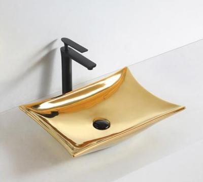 China Easy Clean Arab Ceramic Sanitary Ceramic Sink Ware Wash Basin Gold Art Basin for sale