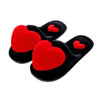 China Fashion trend hot sale bedroom furry slippers women love heart slippers winter plush indoor slipper with heart for sale