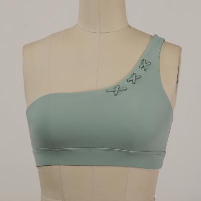 China 2022 breathable new one shoulder breathable sexy inclined adjustable sports bra sports high impact bra for sale