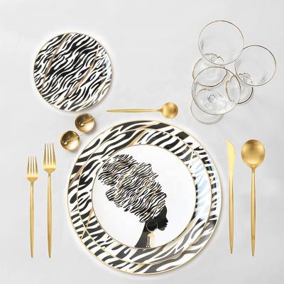 China Sustainable Leopard Modern Design 4 Piece Ceramic Dinner Dishes Plate French Gold Black and White Style Fashion Bone China Dinnerware Set for sale