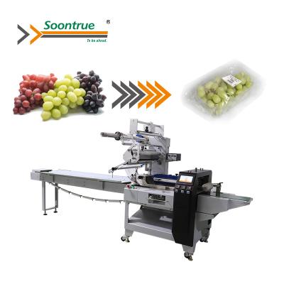 China High Quality Automated Orange Food Mango Grape Avocado Pillow Bag Wrapping Packing Machine for sale