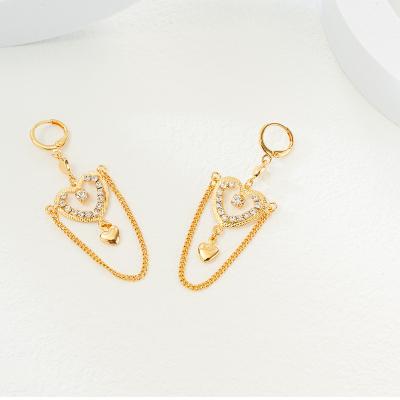 China Red Zircon tassel earrings small love Diamond Peach Heart Hollow Diamond heart-shaped net CLASSIC noble temperament for sale