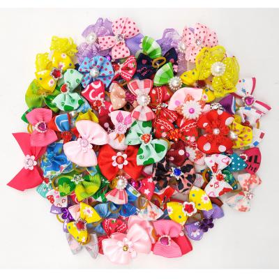 China Viable Wholesale Colorful Dog and Cat Accessories Random Dog Hair Bows for sale