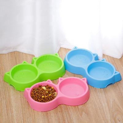 China Top Quality Automatic Pet Products Water Food Cat and Dog Bowl Plastic Cat Face Shape Pet Double Bowl for sale