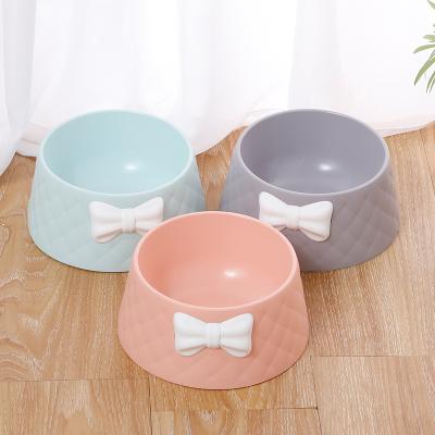 China Automatic Dog Feeding Food Rolls Macaroon New Leak Proof Dog Food Bowl Diamond Pattern Pet Bowl Feeding Arc for sale