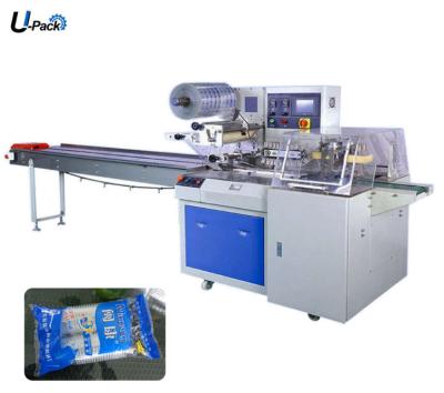 China Automatic horizontal food packaging machine for disposable gloves exchanging flow packing machine for gloves flow bagging machine for sale