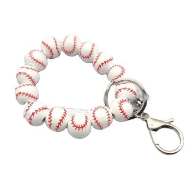 China New Fashion Design Basketball Soccer Volleyball Style Wooden Beads Bracelet Custom Made Key Chain for sale