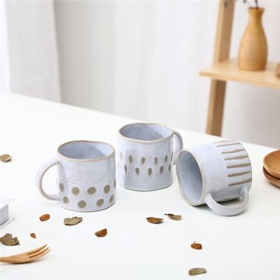 China Viable Wholesale Exquisite Ceramic Cup Point Stripe Relief Hotel Breakfast Tea Milk Coffee Porcelain Mug With Custom Logo for sale