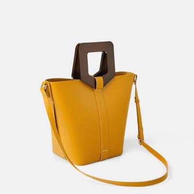 China Leather Handbags 2021 Women Ladies Bucket Handbags Lady Fashion Wooden Handle Long Strap for sale