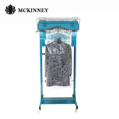 China Garment Packing Good Price Commercial Laundry Shop Clothes Garment Packing Machine Te koop