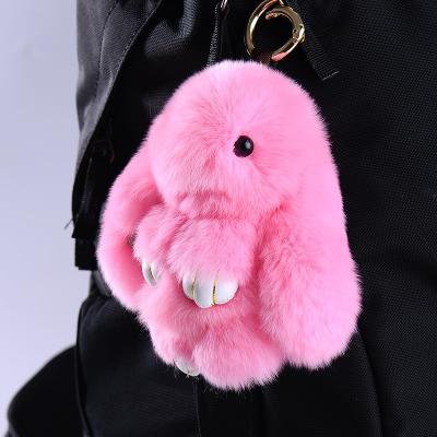 China Simple Color Matching Fur Rabbits Colors By Soft Touch Feeling And Frosted Real Fur Main Chain Pompom for sale