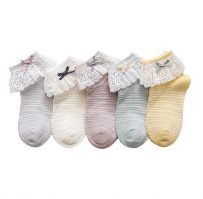 China Custom Cute Baby Socks Solid Color Breathable Soft Girls Socks Cute Kids Lace Up Design Socks for sale