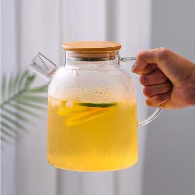 China High Borosilicate Bamboo Capping Basket Viable Glass Large Capacity Teapots Thickened Kettle Pottery Electric Stove Heat Resistant Teapots for sale