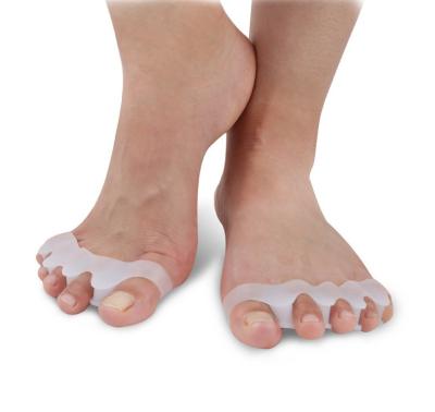 China Comfortable Foot Care Silicone Gel Five Toe Separators Hallux Valgus Correction Tools Correcting Lap Toes for sale