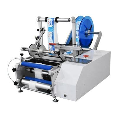 China Semi-automatic food factory outlet sticker round bottle labeling machine for sale