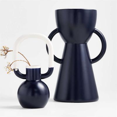 China Nordic Handmade Unique Shape Modern Ceramic Style New Unique Shaped Vases Porcelain Ceramic Flower Vases For Home Decor for sale