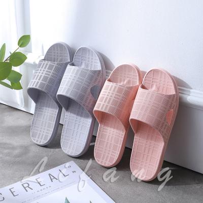 China CUSHIONING Customized PVC Bathroom Couples Slippers Indoor Home Color Flat Slippers for Men and Women for sale