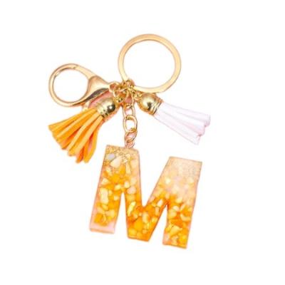 China ABS Tassel Gold Foil A-Z 26 Letter Pending Key Chain For Women Orange Resin Keychain Girls Bag Charms Gifts for sale