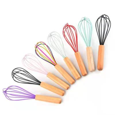 China Viable Hot Selling Silicone Egg Beater High Quality Wooden Handle Multifunctional Egg Beater for sale