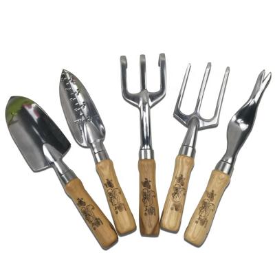 China Perfect Professional Garden Tool Kit Fork Trowel Kit Color Printing Design Aluminum Kids Garden Tools for sale