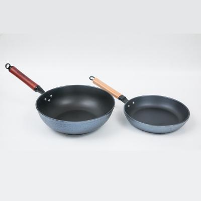 China Long lasting traditional chinese wok cast iron cookwarewok pan cooking flat bottom ceramic woks for sale