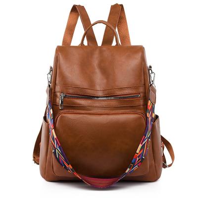 China Waterproof Inventory Sale Fashion Brown Waterproof Leather Bookbags For Men's Large Capacity College Anti-theft Casual Backpack for sale