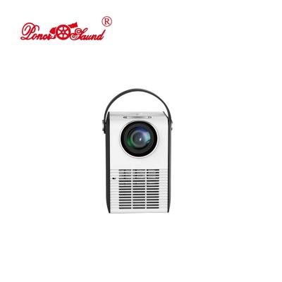 China Newest 2022 Built-in Speakers Mini Portable LCD 720p Projector With Hand Belt Home Theater Pico Portable Projectors for sale