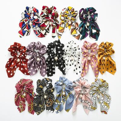 China Wholesale Custom Women Fashion Satin Printing Elastic Hair Accessories Satin Scarf Bow Pearl Scrunchies Rabbit Ears Hair Tie for sale