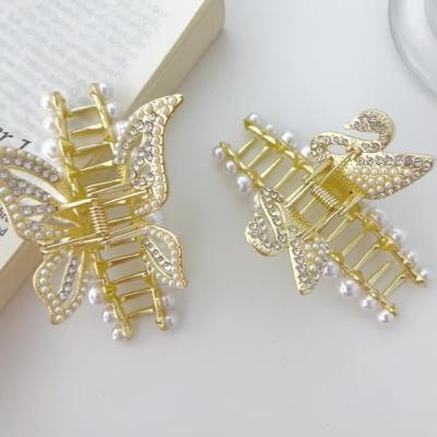 China Fashion Alloy Swan Butterfly Hair Claw Crystal Metal Claw Clip Catch Rhinestone Bling Pearl Rhinestone Clip Shark Clip for sale