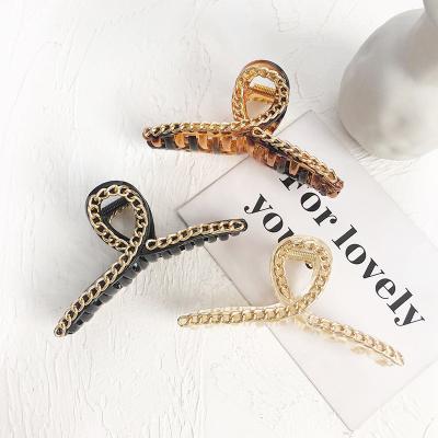 China New Design Plastic Resin/Hair Jaw Metal Plastic Sleek Chain Clips Big Cross Clear Resin Hair Claw Clip Women Popular for sale