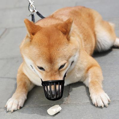 China Custom Breathable Plastic Dog Basket Muzzle Anti-Bite Chewing Adjustable Dog Muzzle for sale