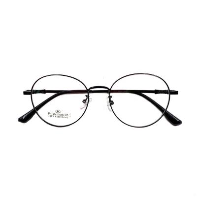 China Fashionable Wholesale Retro Round Full-rim Metal Frame Memory Temple Clear Glasses for sale