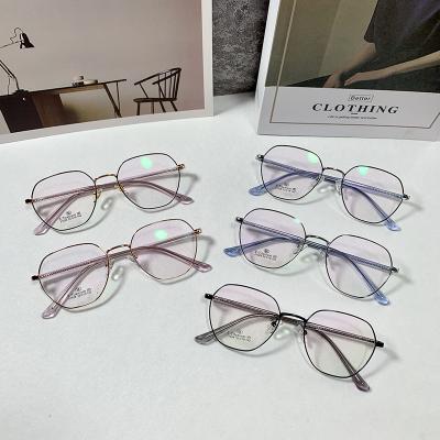 China Fashionable Retro Metal Glass Eyewear Frames Titanium Vintage Eyeglasses Frames For Women Men for sale