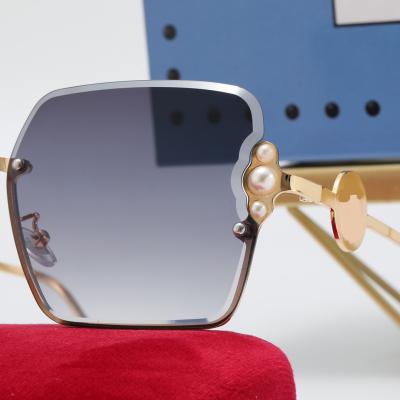 China Fashion Sunglasses 2022 Wholesale Designer Luxury Rimless Oversized Brand Sunglasses Diamond Balance Sun Glasses for sale