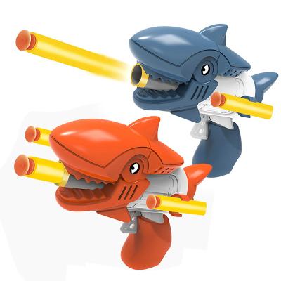 China Toy Gun Hot Selling Soft Cartoon Shark Shooting Air Eva Bullet Gun Kids For Boys for sale