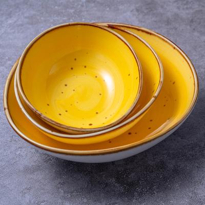 China Viable Hot Selling Bright Color Glazed Soup Bowl Porcelain Edged Fancy Ceramic Soup Bowls for sale