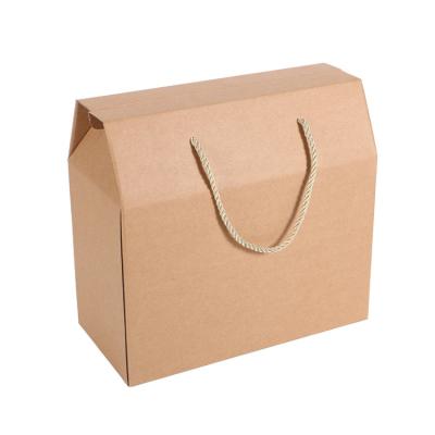 China Custom Logo Wholesale Brown Kraft Packaging Paper Boxes Low Price High Quality Handmade With Handle for sale